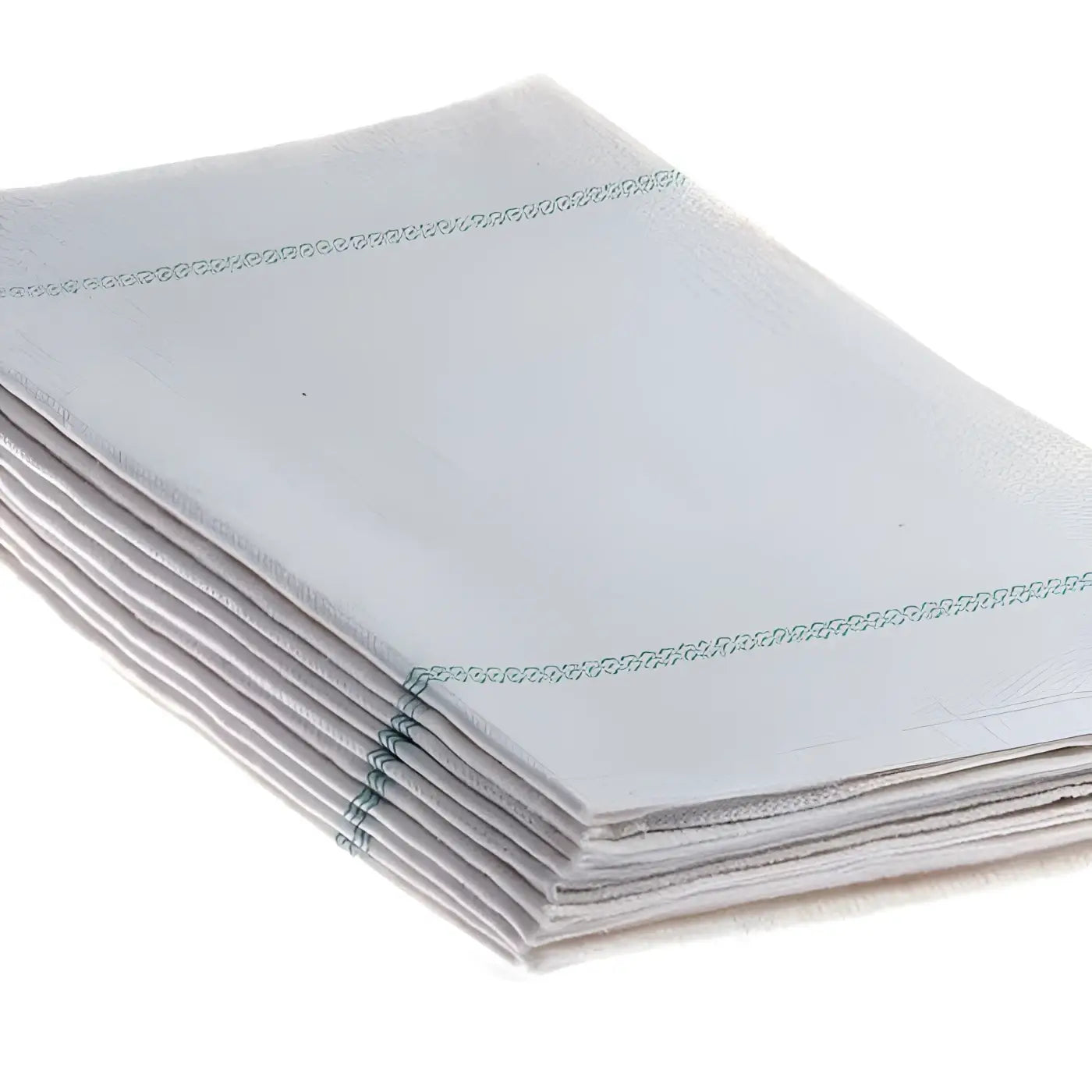 Stapel aus hellgrauen leinenservietten mit dezenten mintgrünen steppnähten für floorstar nähvlies bodentuch effekt vb 60