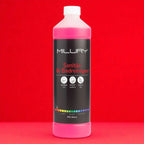 Rosa flüssiges milury sanitär und badreiniger konzentrat in durchsichtiger flasche mit weißem verschluss und schwarzem etikett