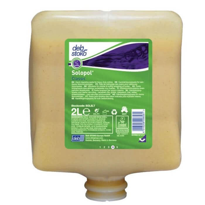 A 2-liter translucent yellow plastic dispenser bottle of deb stoko solopol lösemittelfreie handreinigungspaste kartusche