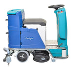 Wetrok drivematic delight dosing scheuersaugmaschine mit blauem und türkisfarbenem design, schwarz lenkrad und grauem sitz